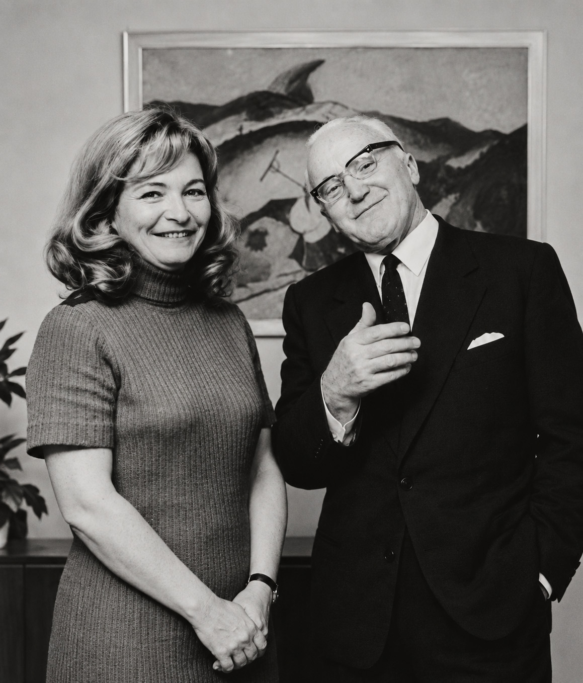 Klára Havlíková and Eugen Suchoň in a black-and-white photograph in front of a painting